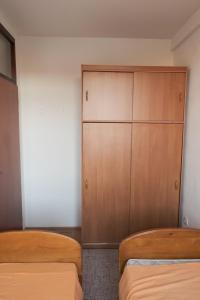 Ένα ή περισσότερα κρεβάτια σε δωμάτιο στο Banja Luka Lux