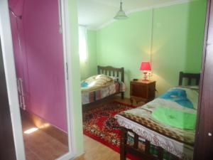 Postel nebo postele na pokoji v ubytování Hotel Tekla