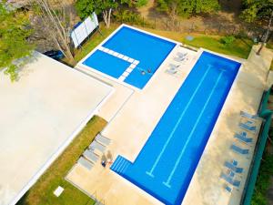 Πισίνα στο ή κοντά στο Playa Mantas 7th Floor Sea View Beach Access