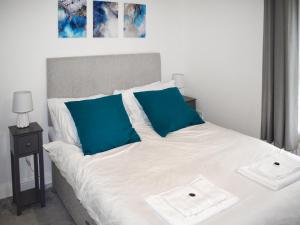 Postel nebo postele na pokoji v ubytování Cliffside Cottage + 4 fotografie