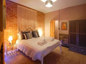 En eller flere senge i et værelse på Villa Otto + 16 billeder