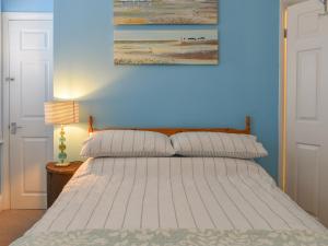 Postel nebo postele na pokoji v ubytování Beachcroft