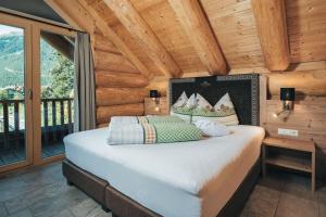 Postel nebo postele na pokoji v ubytování Summit Lodges