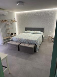 Ένα ή περισσότερα κρεβάτια σε δωμάτιο στο Maison Salita Chiesa 18