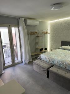 Ένα ή περισσότερα κρεβάτια σε δωμάτιο στο Maison Salita Chiesa 18