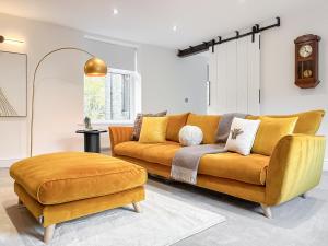 Et opholdsområde på Golden Goose Cottage - Ukc7087