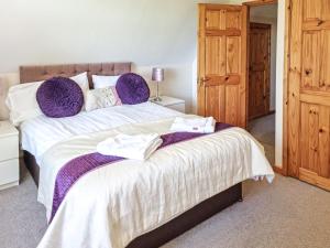 Ένα ή περισσότερα κρεβάτια σε δωμάτιο στο Dartmoor 3