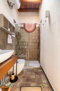 Koupelna v ubytování La Finestra su Noto + 17 fotografií