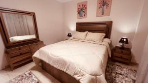 Кровать или кровати в номере Cairo, Madinaty, 2BR, Furnished apartment