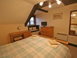 En eller flere senge i et værelse på Miller's Cottage + 6 billeder