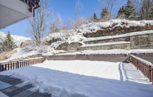 a pile of snow on the stairs of a house at Casa Maria Grazia in Sauze dʼOulx