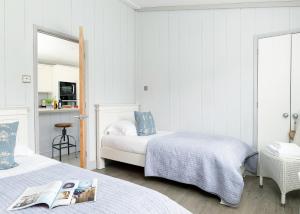 Ένα ή περισσότερα κρεβάτια σε δωμάτιο στο Aspen Lodge Escape