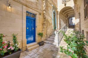 Η πρόσοψη ή η είσοδος του Modern 3 Bedroom Stay in Mgarr by SF Homes