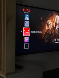 Μια τηλεόραση ή/και κέντρο ψυχαγωγίας στο Apartment Donna