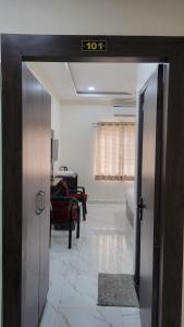 an open door to a room with a living room at Samriddhi Homestay in Varanasi