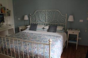 Кровать или кровати в номере Maso Poffer - Cà del Bosco