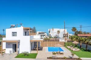 Πισίνα στο ή κοντά στο Villa Kamelia Seaside Almyra by Villa Plus