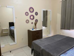 Ένα ή περισσότερα κρεβάτια σε δωμάτιο στο Residencial Arcoiris