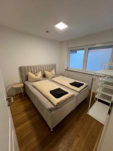 Giường trong phòng chung tại To&To Apartments 2-2 Bedroom