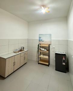 Η κουζίνα ή μικρή κουζίνα στο Sireh Residence