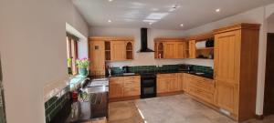 Η κουζίνα ή μικρή κουζίνα στο Stylish Lodge in the Peak District sleeps up to 9 +5 φωτογραφίες