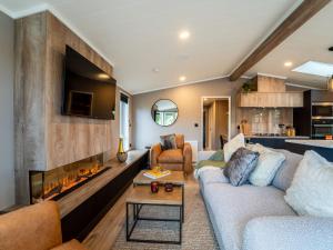 Μια τηλεόραση ή/και κέντρο ψυχαγωγίας στο Coed Aros Lodge