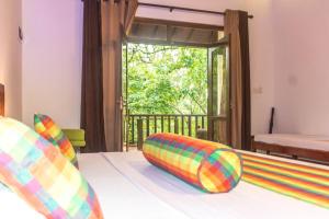 Giường trong phòng chung tại Heaven in Satinwoods