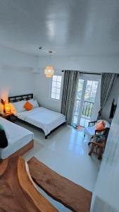 Postel nebo postele na pokoji v ubytování Awesome Stay in Baguio