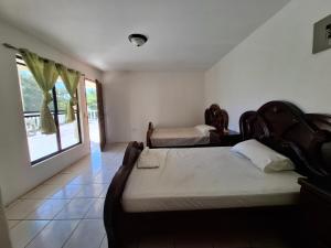 Postel nebo postele na pokoji v ubytování Noatun House