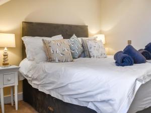 En eller flere senge i et værelse på Harbour