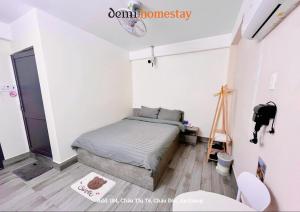 En eller flere senge i et værelse på DeMi Homestay 2 - Châu Đốc