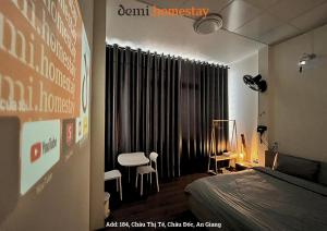 Giường trong phòng chung tại DeMi Homestay 2 - Châu Đốc +20 ảnh