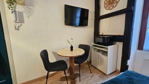 Η κουζίνα ή μικρή κουζίνα στο Le Remède - Studio calme hyper-centre Orléans