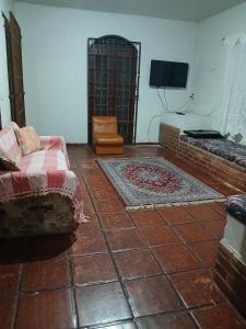 TV a/nebo společenská místnost v ubytování Lar Costa Azul