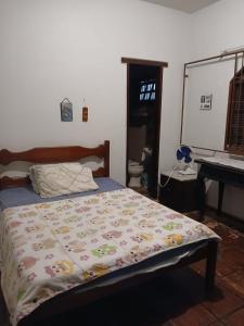 Postel nebo postele na pokoji v ubytování Lar Costa Azul