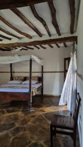 Postel nebo postele na pokoji v ubytování Evara House