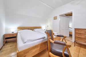 Postel nebo postele na pokoji v ubytování Haus Erni