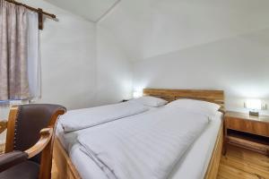 Postel nebo postele na pokoji v ubytování Haus Erni