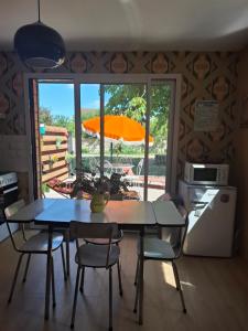 Foto sihtkohas Amfréville asuva majutusasutuse Maisonnette Rétro Loc galeriist