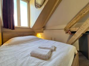 Postel nebo postele na pokoji v ubytování Romains - Bel appartement à Reims