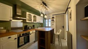 Køkken eller tekøkken på Les Terrasses de Saint Jacques