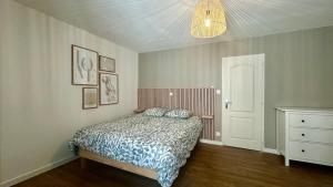 En eller flere senge i et værelse på Les Terrasses de Saint Jacques