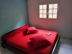 Ένα ή περισσότερα κρεβάτια σε δωμάτιο στο Les terrasses de Maëlle II +17 φωτογραφίες