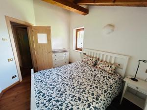 Ένα ή περισσότερα κρεβάτια σε δωμάτιο στο Albaredo Wood Terasse