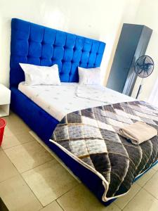 Ένα ή περισσότερα κρεβάτια σε δωμάτιο στο Empire Motel