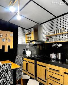 Kuchyň nebo kuchyňský kout v ubytování The Cottage Ambewela by 47