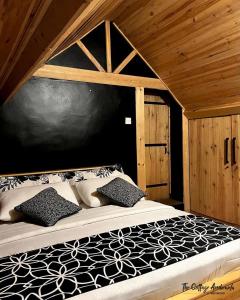 Postel nebo postele na pokoji v ubytování The Cottage Ambewela by 47