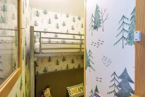 En eller flere senge i et værelse på Le Chitelet 104 - Quelques pas de la station