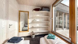 Ένα ή περισσότερα κρεβάτια σε δωμάτιο στο Schwarzwaldstrand Ferienwohnungen +77 φωτογραφίες