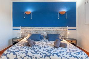 Postel nebo postele na pokoji v ubytování Pura Vida - Ventanas De Lanzarote